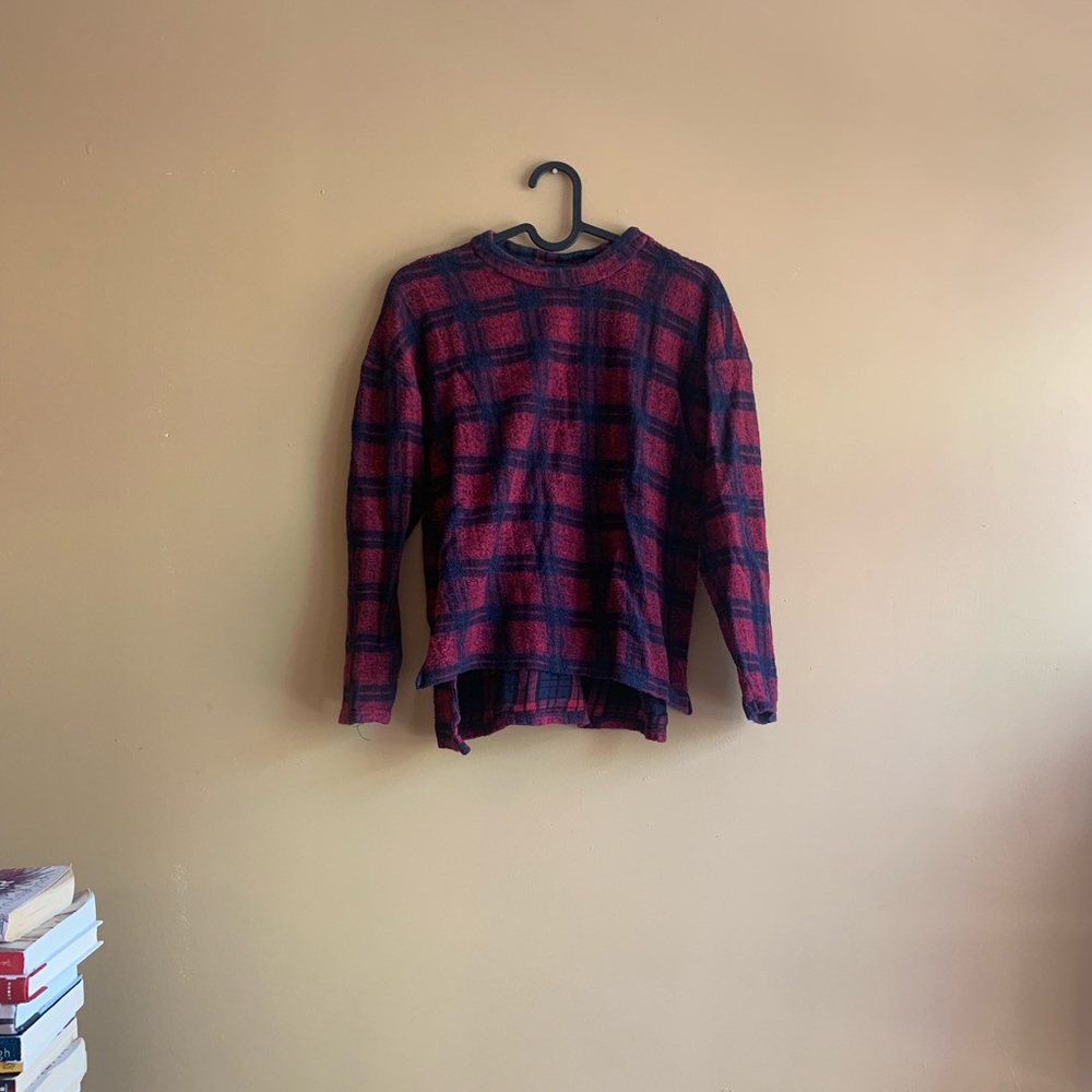 Checkerboard red and blue wool sweater.